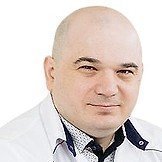 Врач Емкужев Олег Леонович